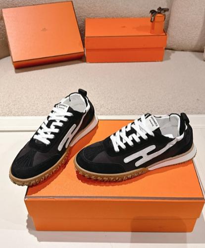 Hermes black and white gum-sole sneakers