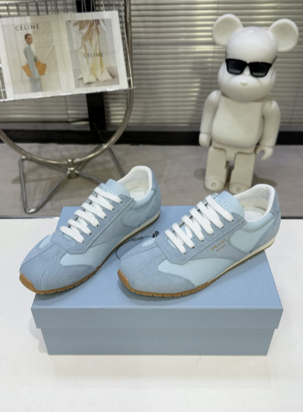 Prada light blue cream-paneled low-profile sneakers