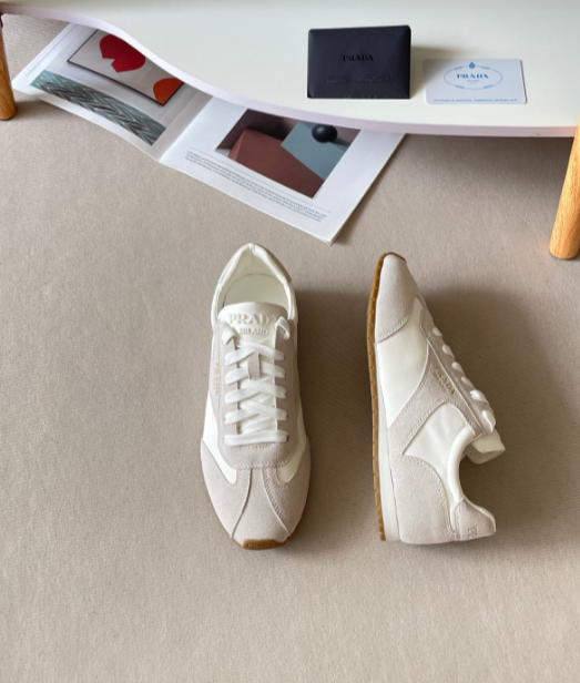 Prada cream low-profile lace-up sneakers
