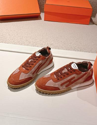 Hermes rust patterned gum-sole sneakers