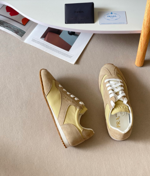 Prada gold low-profile lace-up sneakers