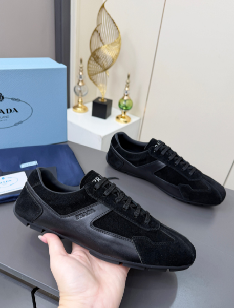 Prada black tonal-paneled lace-up sneakers