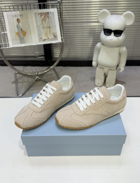 Prada taupe cream-paneled low-profile sneakers