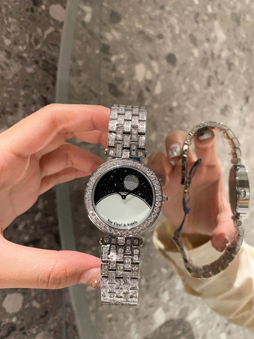 Van Cleef & Arpels Silver Watch